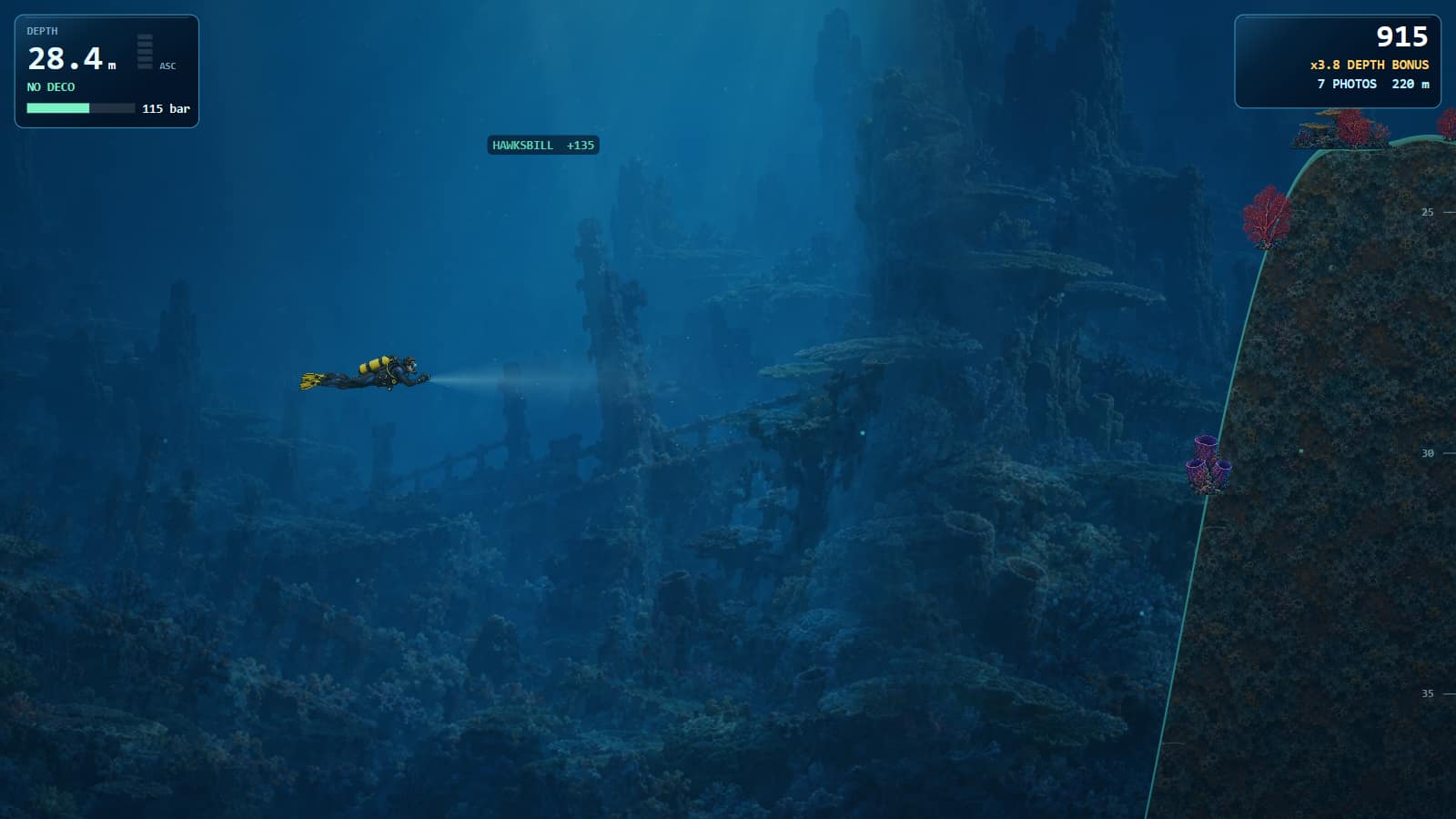 A diver at 26.8 metres beside a reef wall in dark blue water, torch beam on, with the score showing a 3.7 times depth bonus
