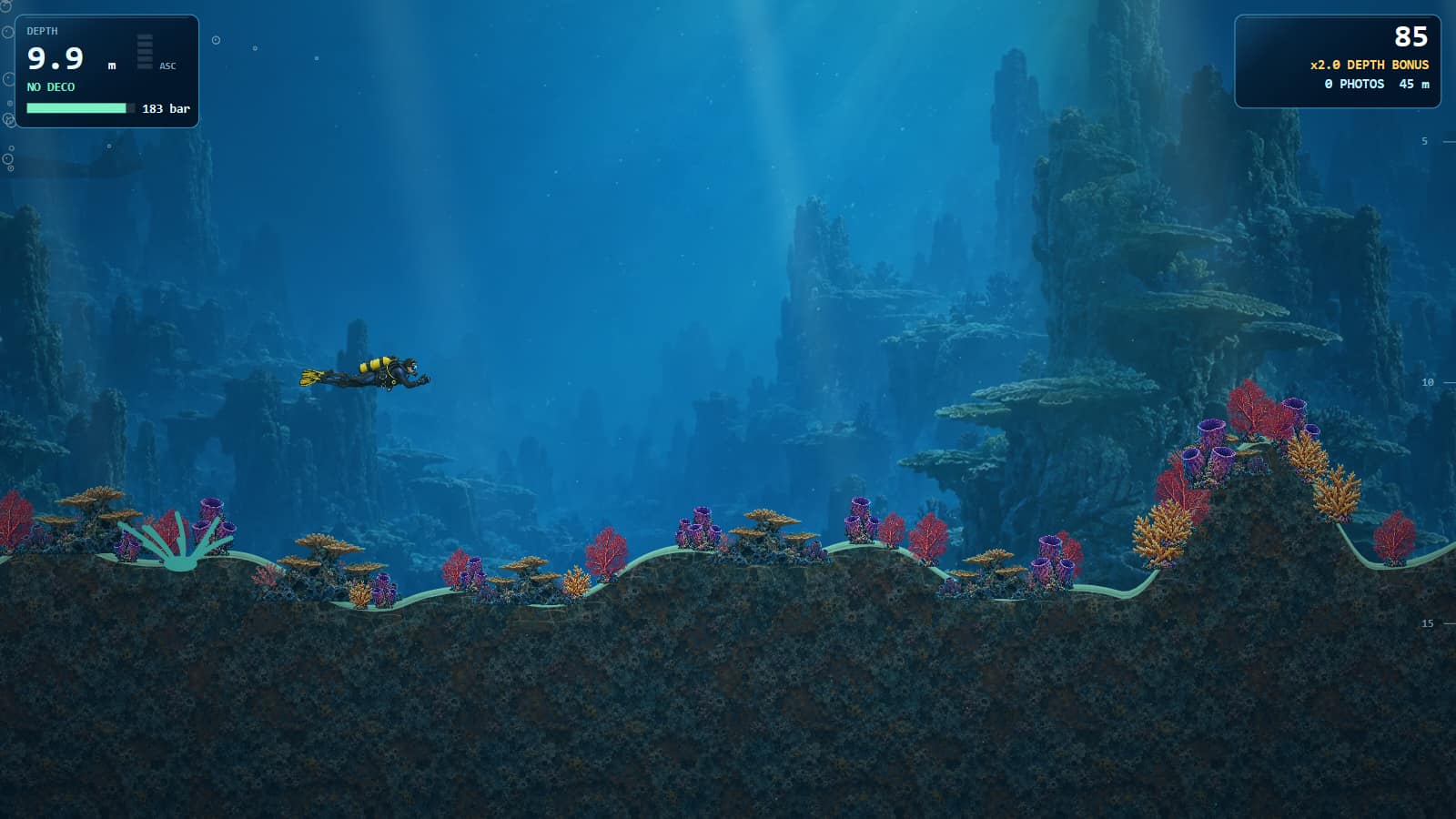 A scuba diver at 9.3 metres finning over coral mounds with sea fans, table corals and a barrel sponge, sun rays from above, a school of fish in the distance and the dive computer readout in the corner