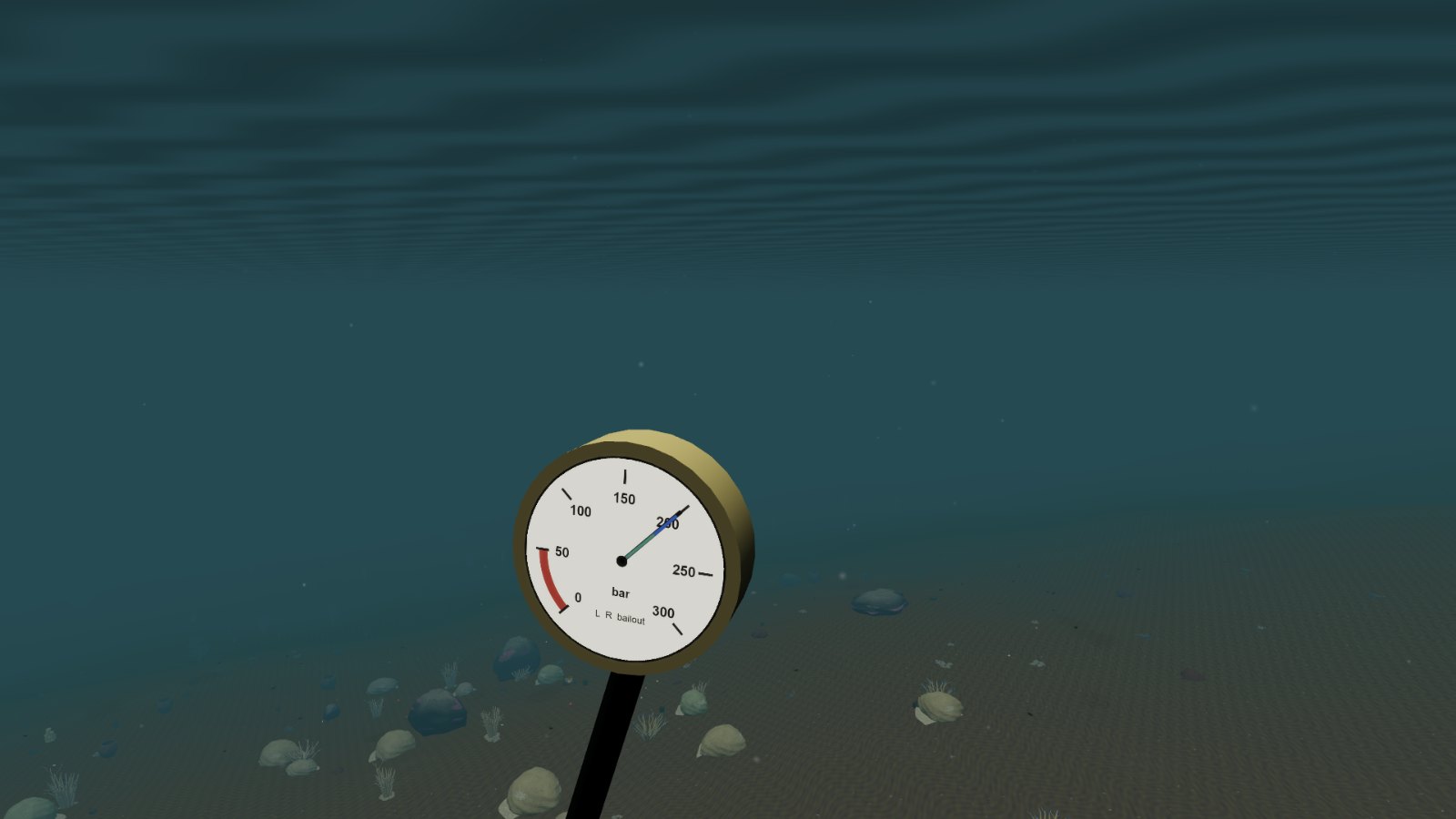 First-person view of a submersible pressure gauge on its hose reading about 200 bar, with the reef below