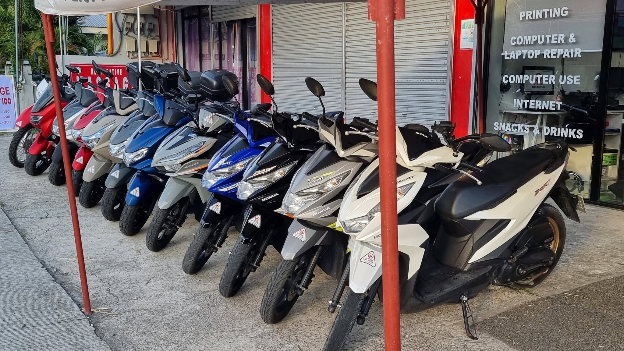 Part of the U-Ride fleet lined up outside the shop